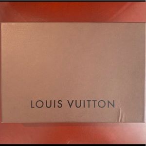 Louis Vuitton’s Monogram Patent Leather Clutch